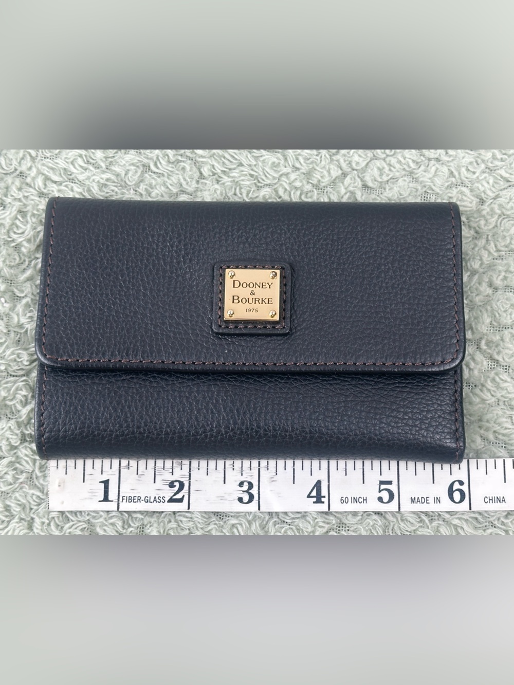 Dooney & Bourke Black Pebbled Leather Compact Wallet with Gold Plaque - Picture 13 of 14